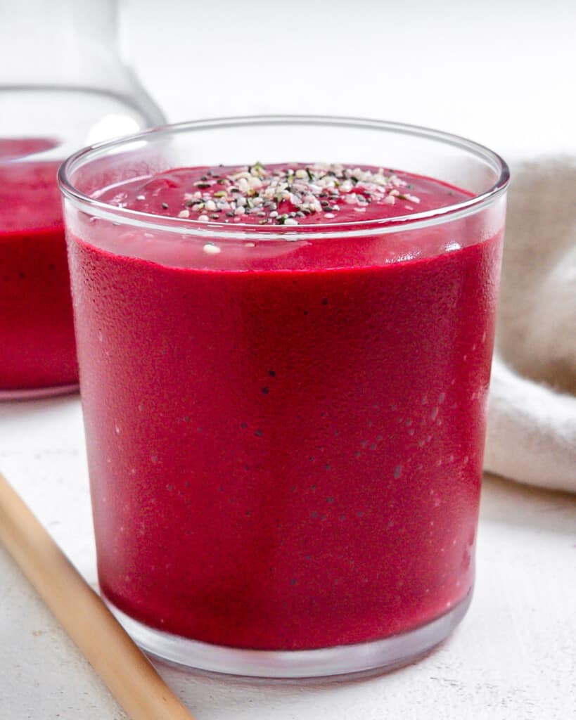 a beet smoothie with chia seeds on top.