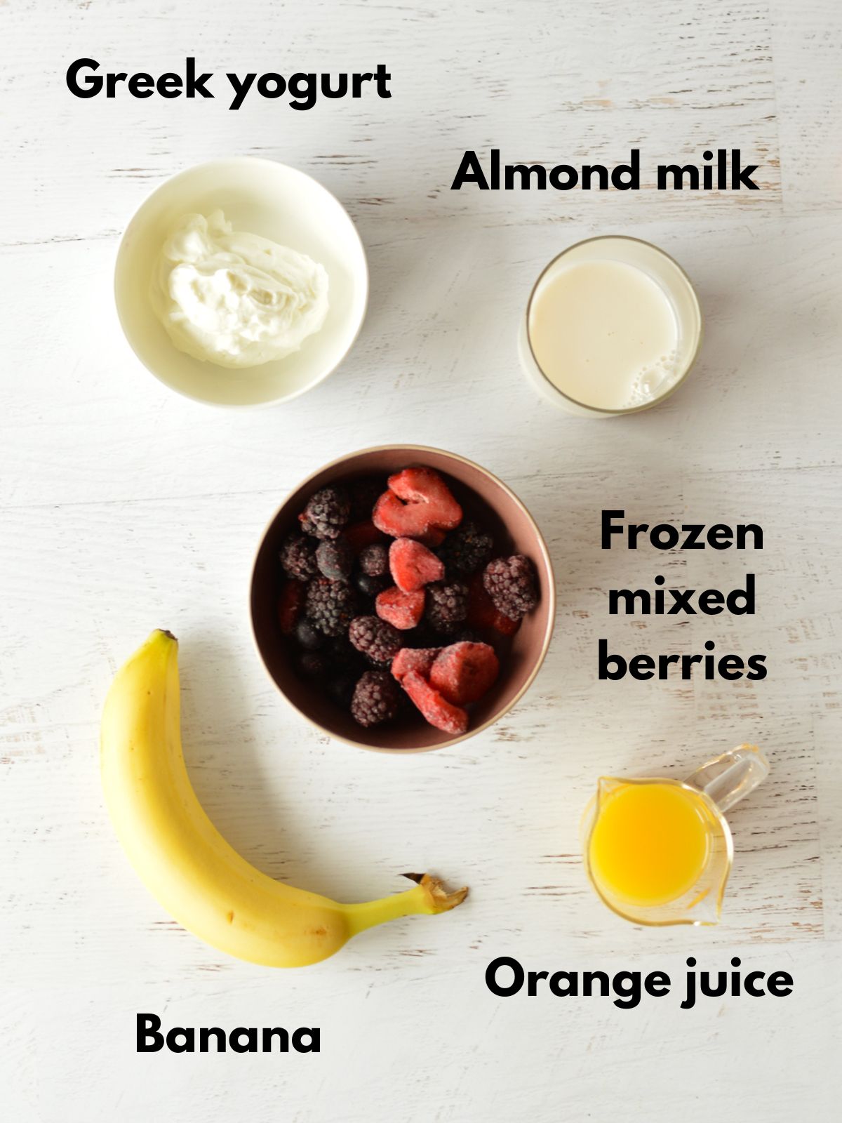 yogurt, almond milk, berries, orange juice, and banana.