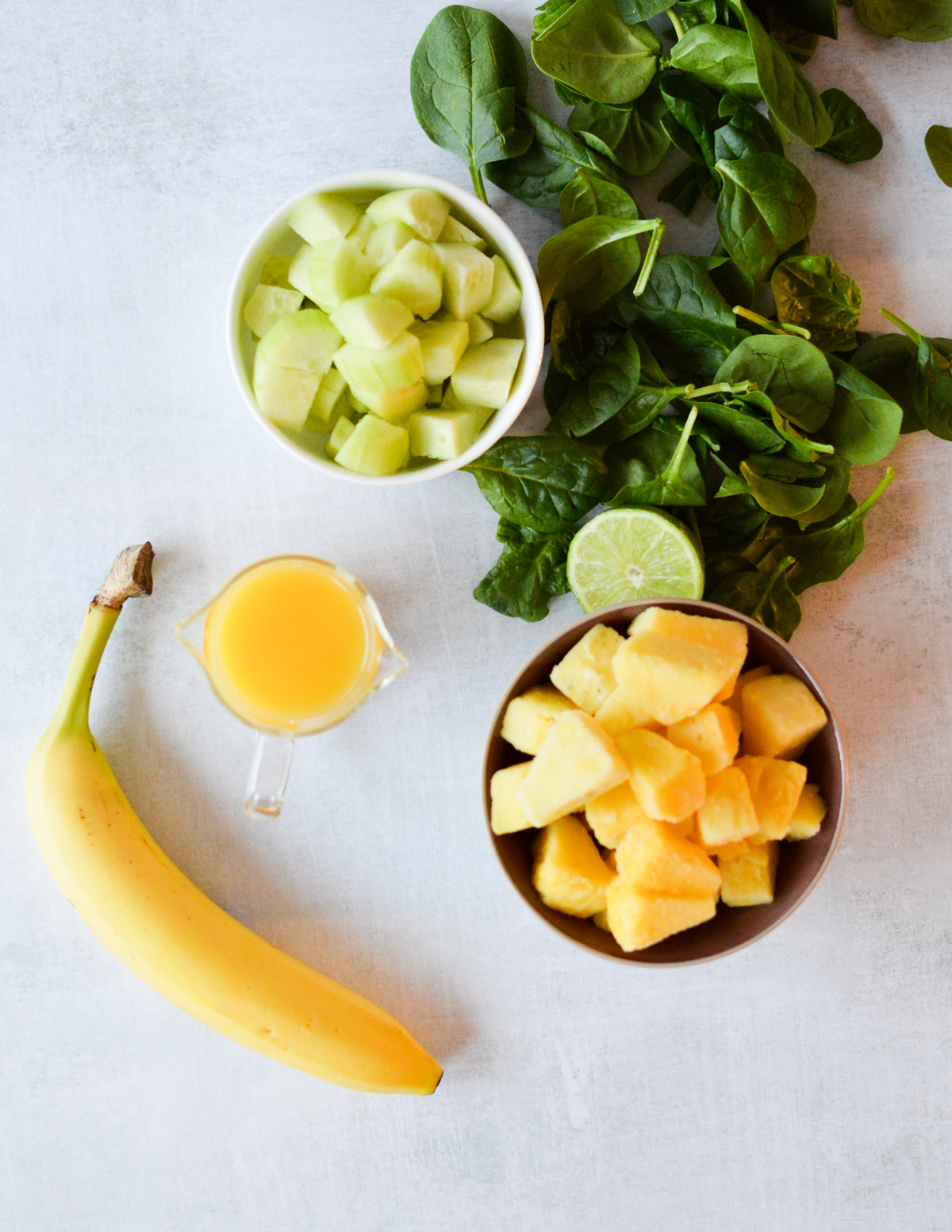 spinach, banana, cucumber, lime, and pineapple.