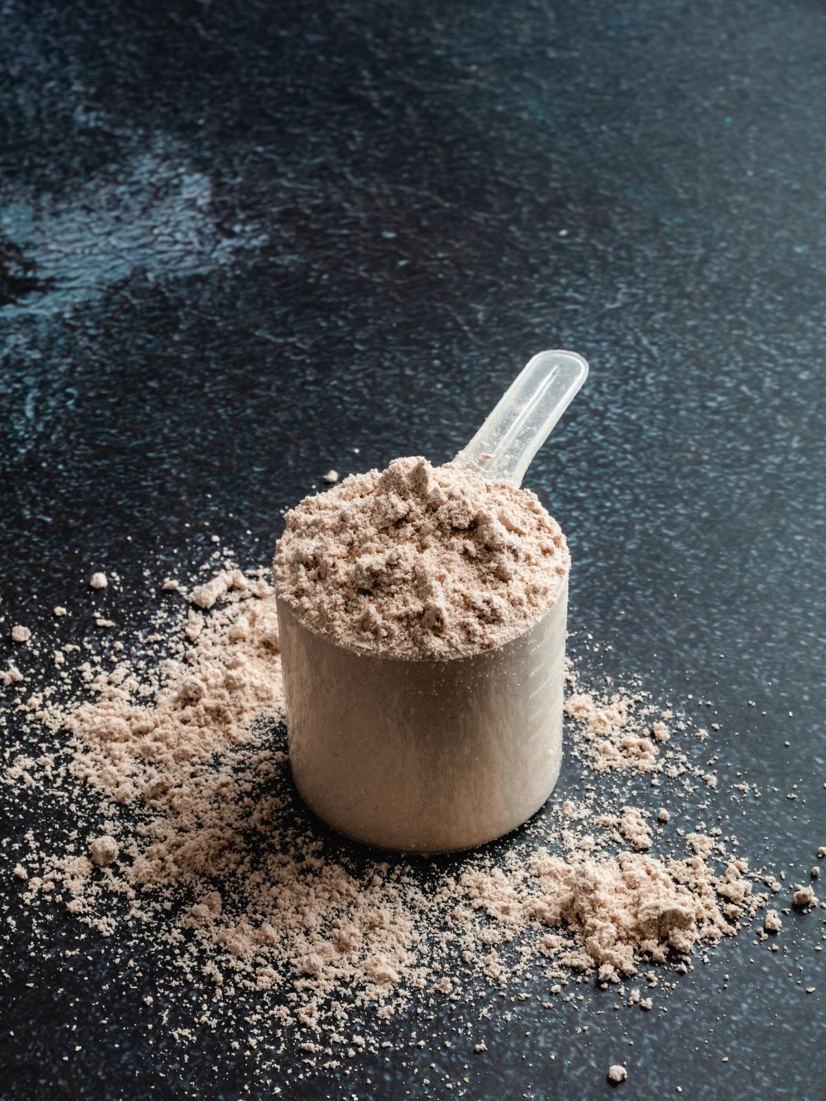 a scoop of chocolate protein powder.