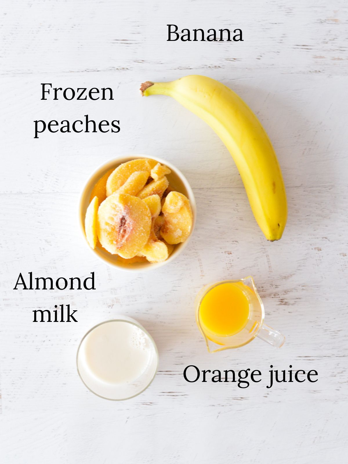 banana, frozen peaches, orange juice, almond milk.