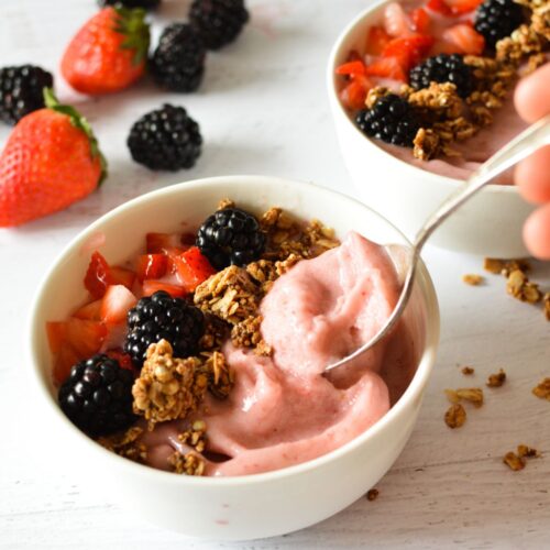 a spoonful of strawberry smoothie.