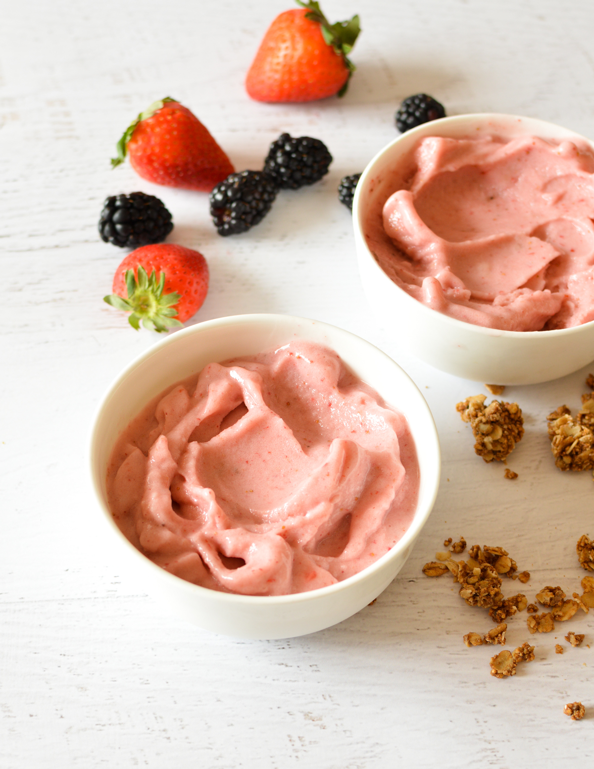 two strawberry smoothie bowls.