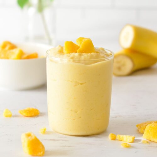 mango smoothie with mango on top.