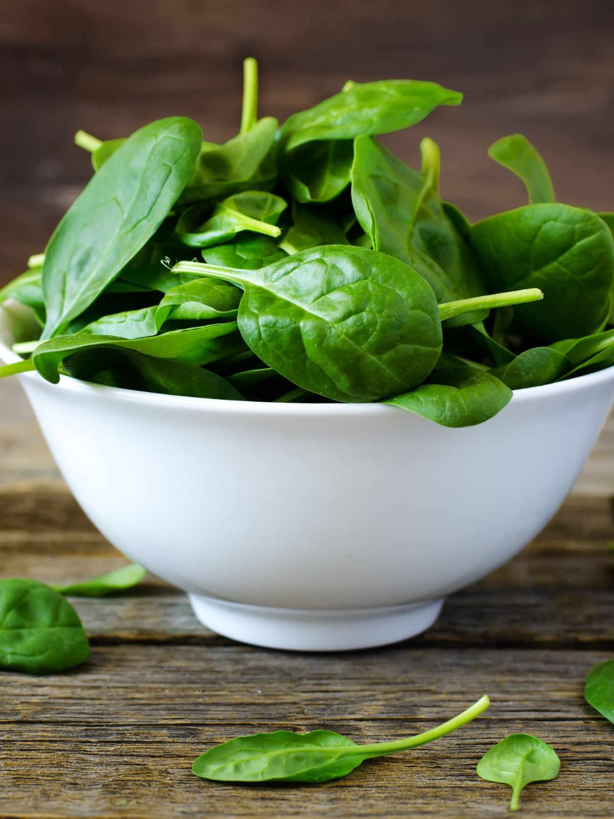 a bowl of spinach leaves.