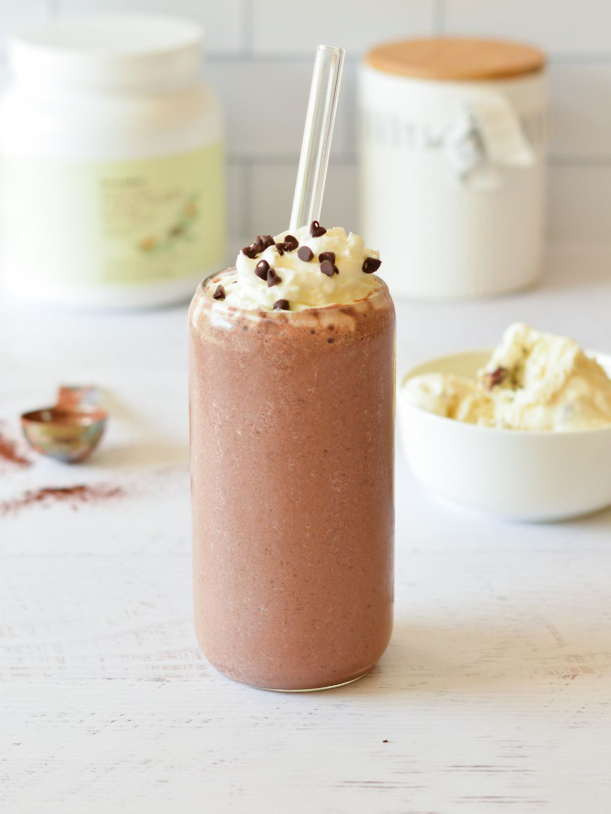 chocolate protein smoothie with whipped cream.