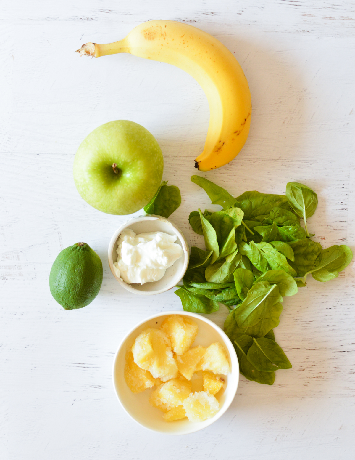 banana, green apple, spinach, lime, greek yogurt, and pineapple.
