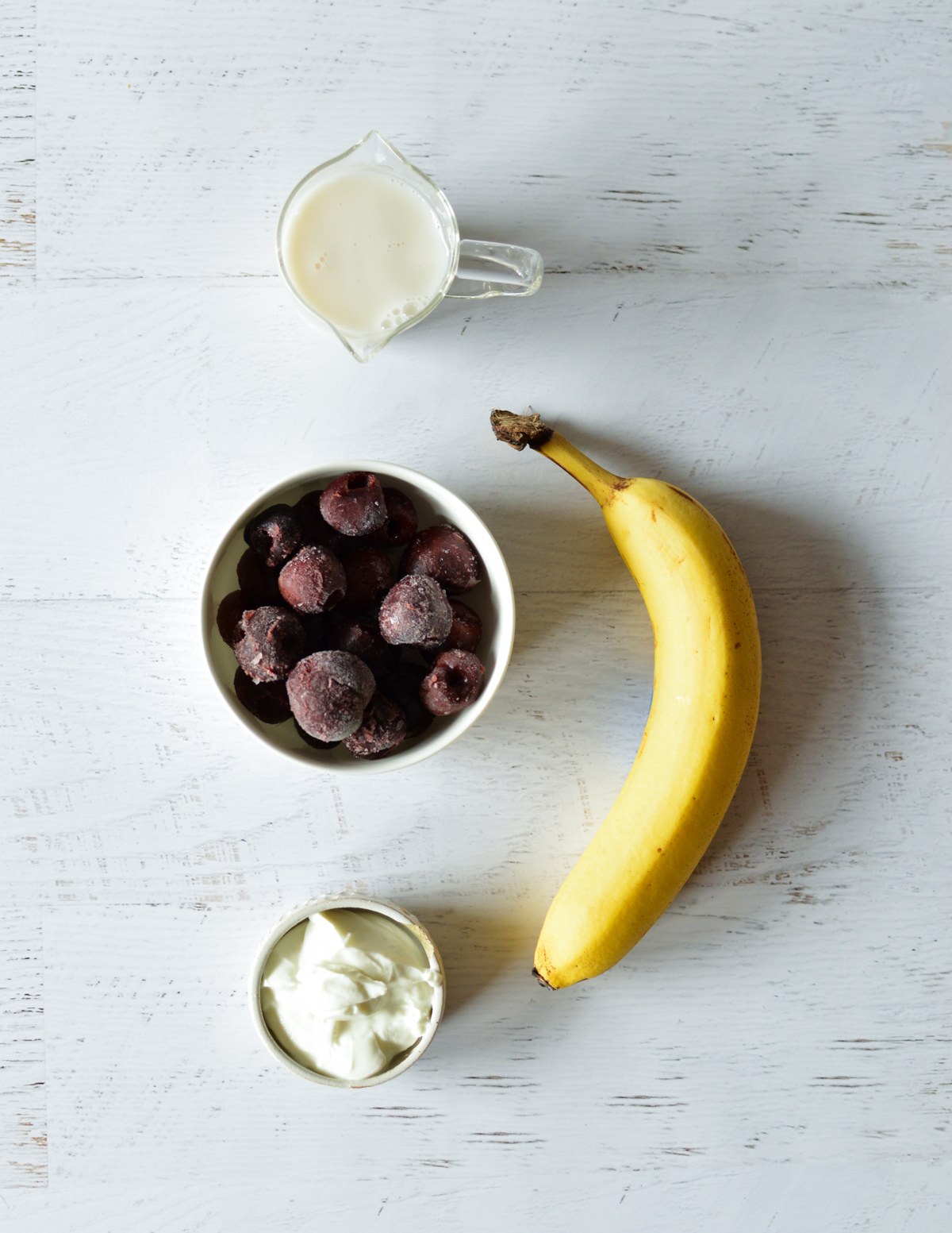 banana, frozen cherries, yogurt, almond milk.