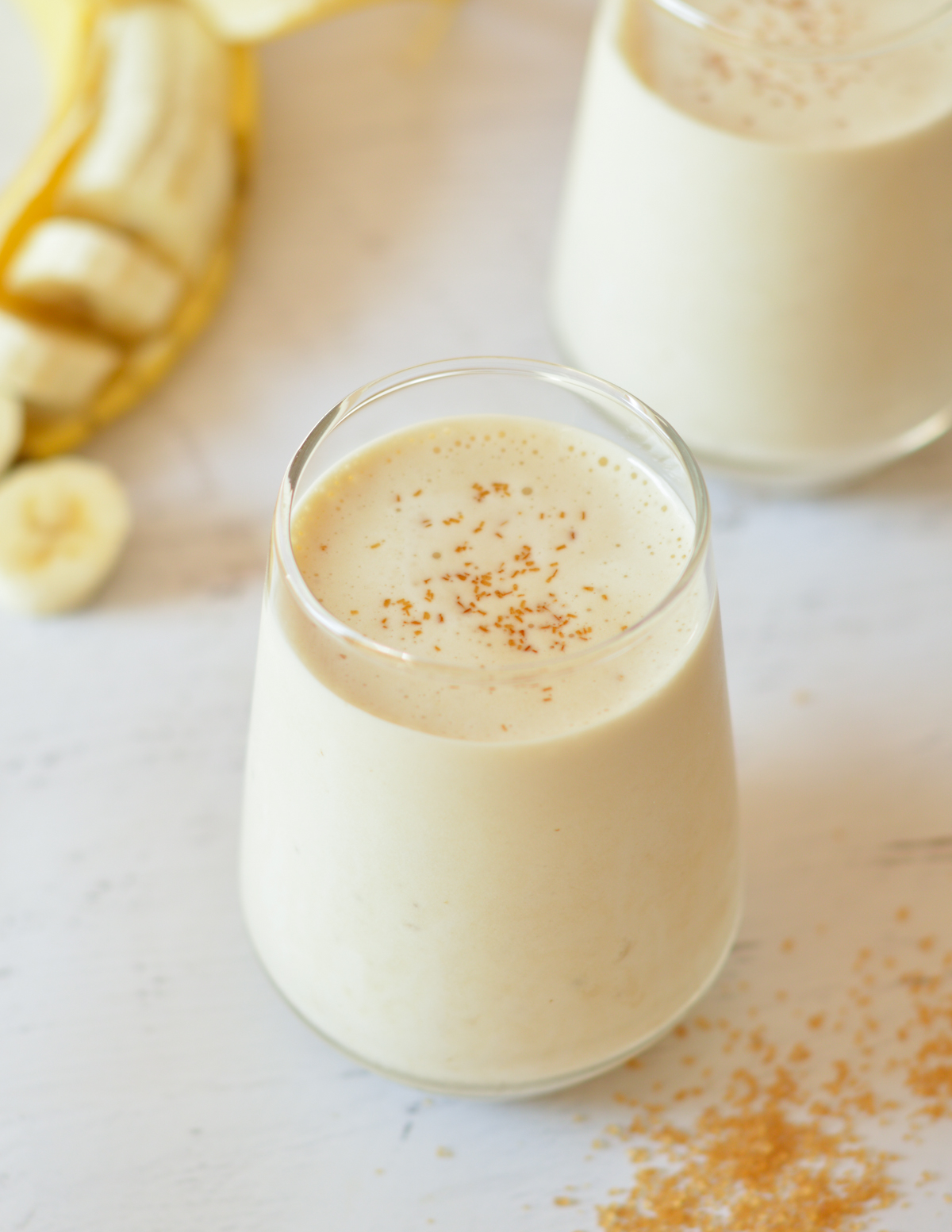 banana smoothie with turbinado on top.