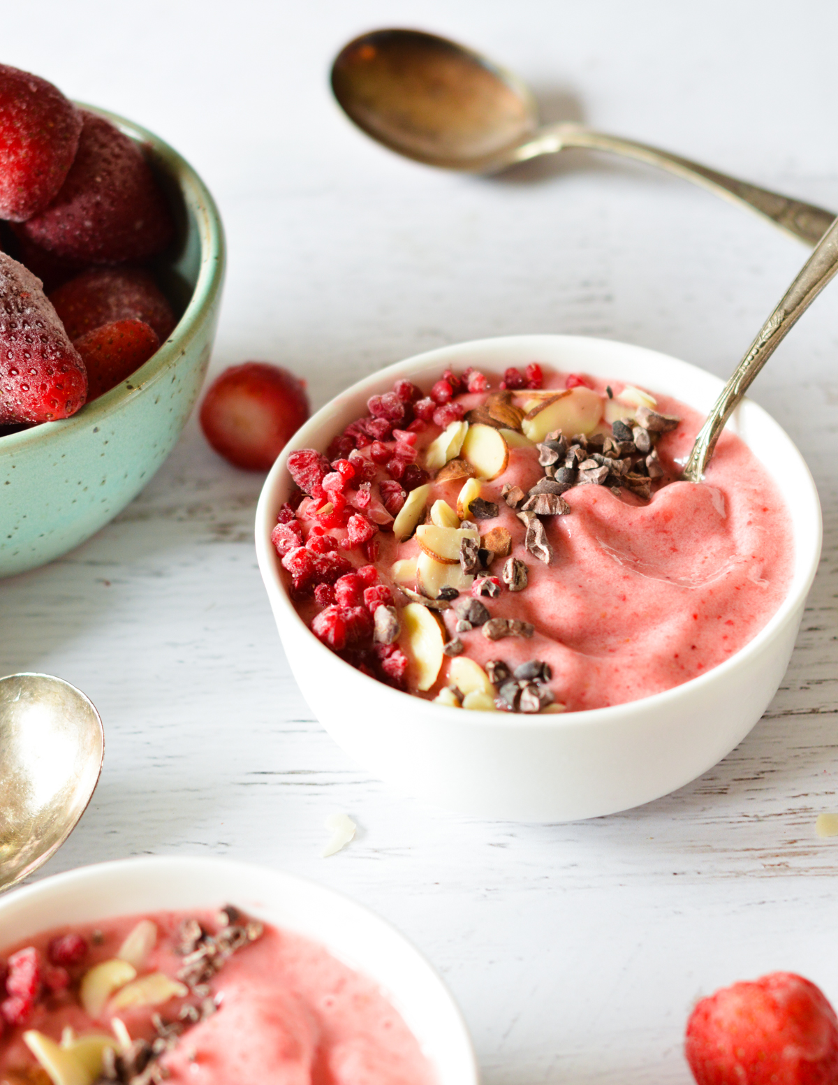 strawberry smoothie bowl with toppings.
