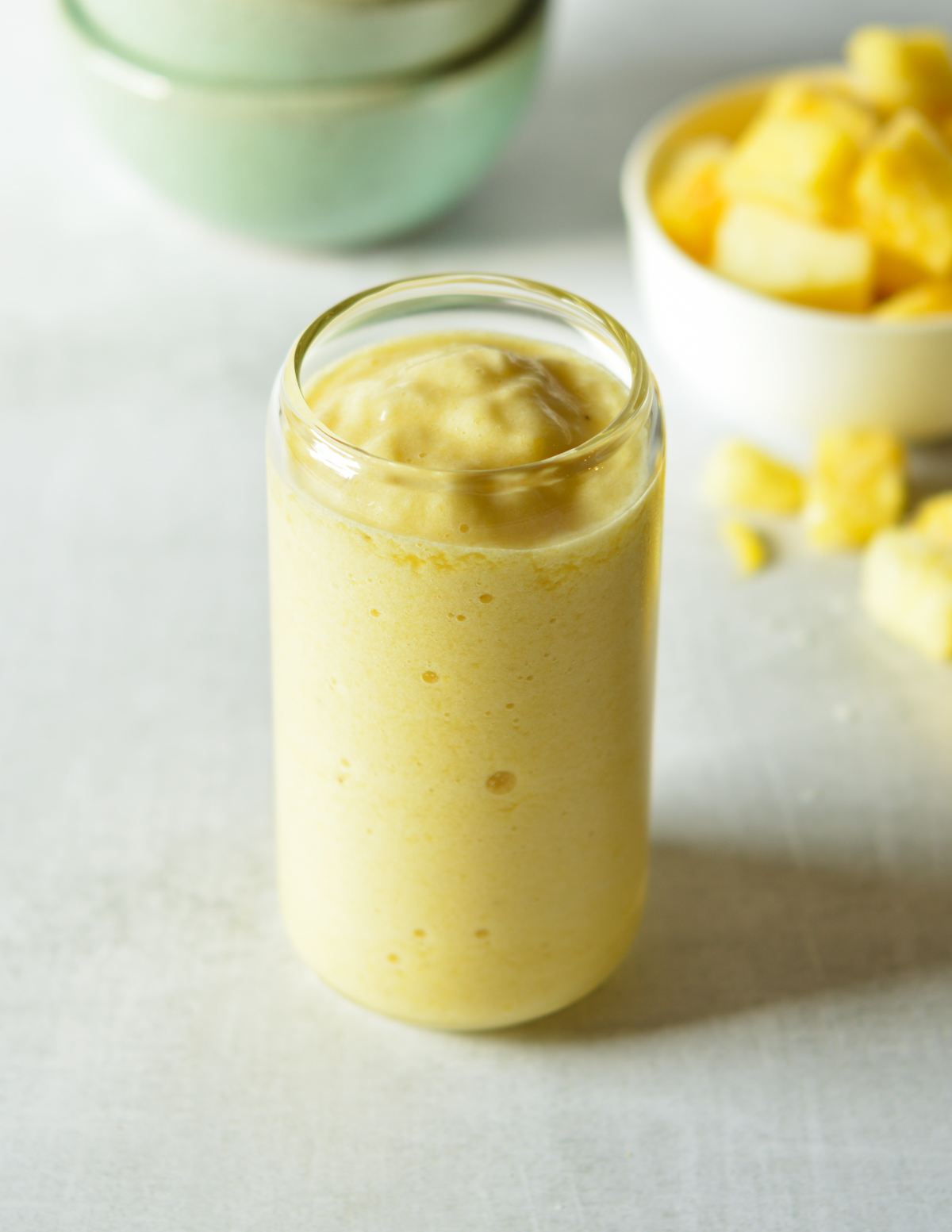 pineapple smoothie in a glass jar.