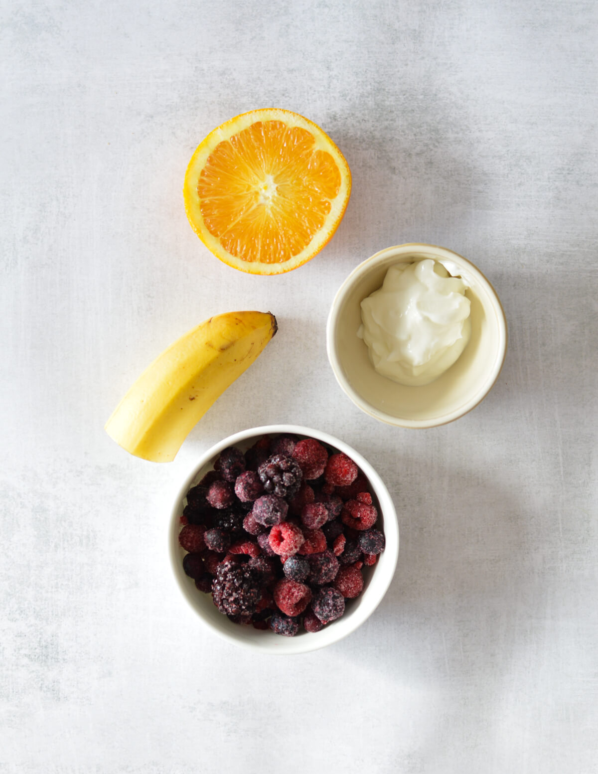 mixed berries, yogurt, banana, orange.