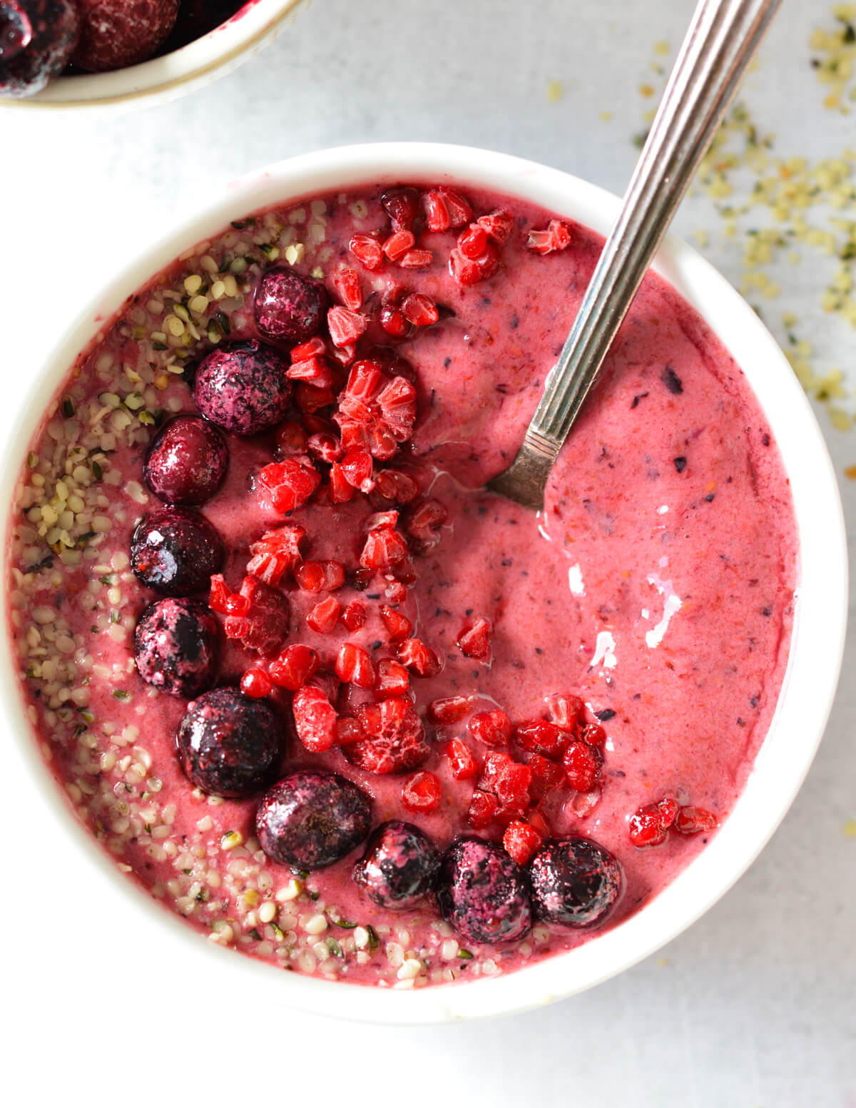 berry smoothie bowl with berries and hemp hearts.