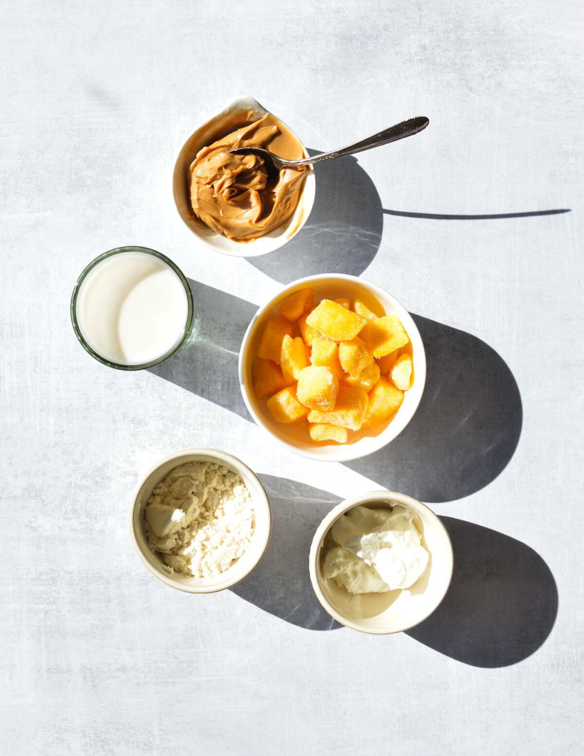 peanut butter, almond milk, mango, vanilla protein, yogurt.