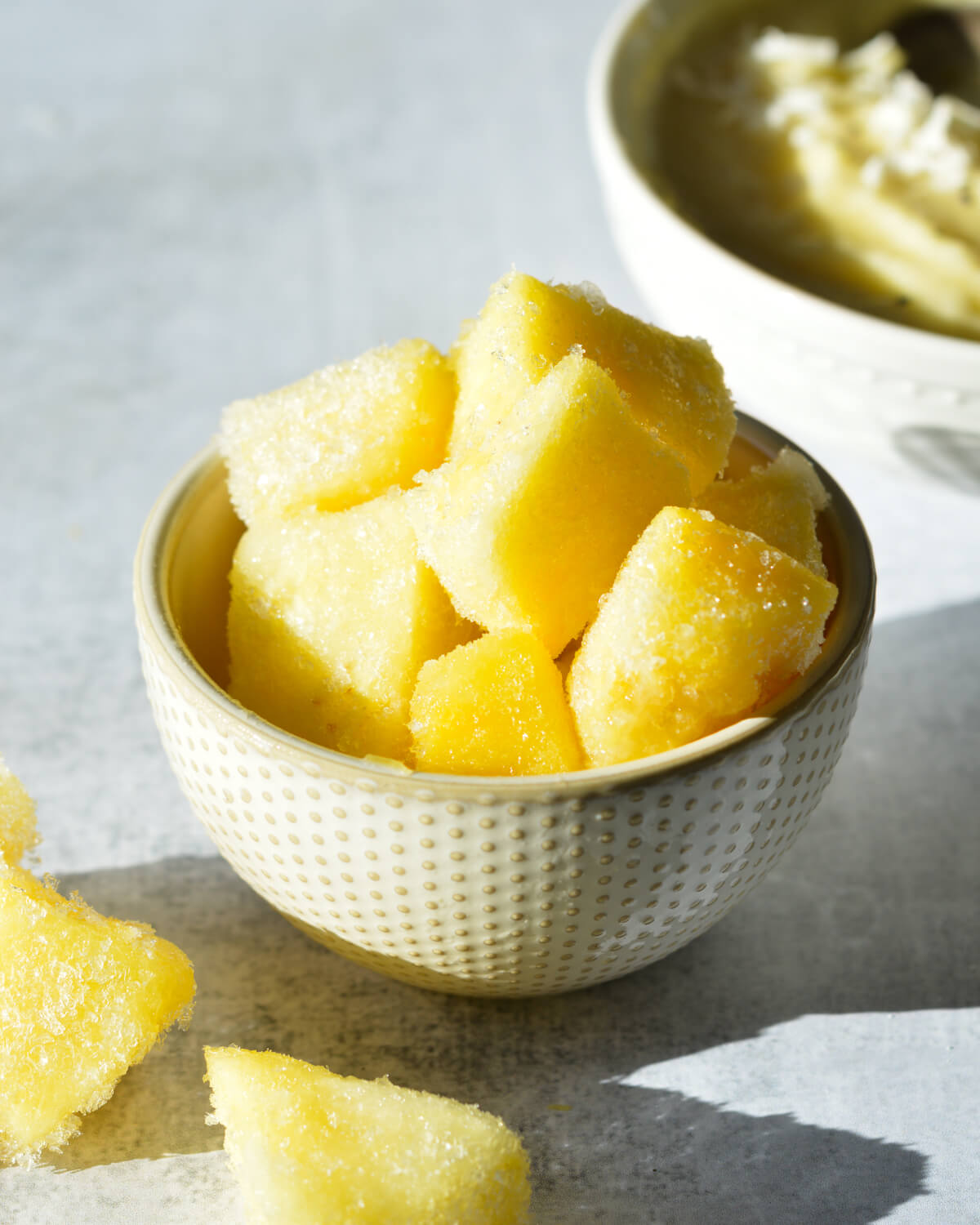 a bowl of frozen pineapple. 